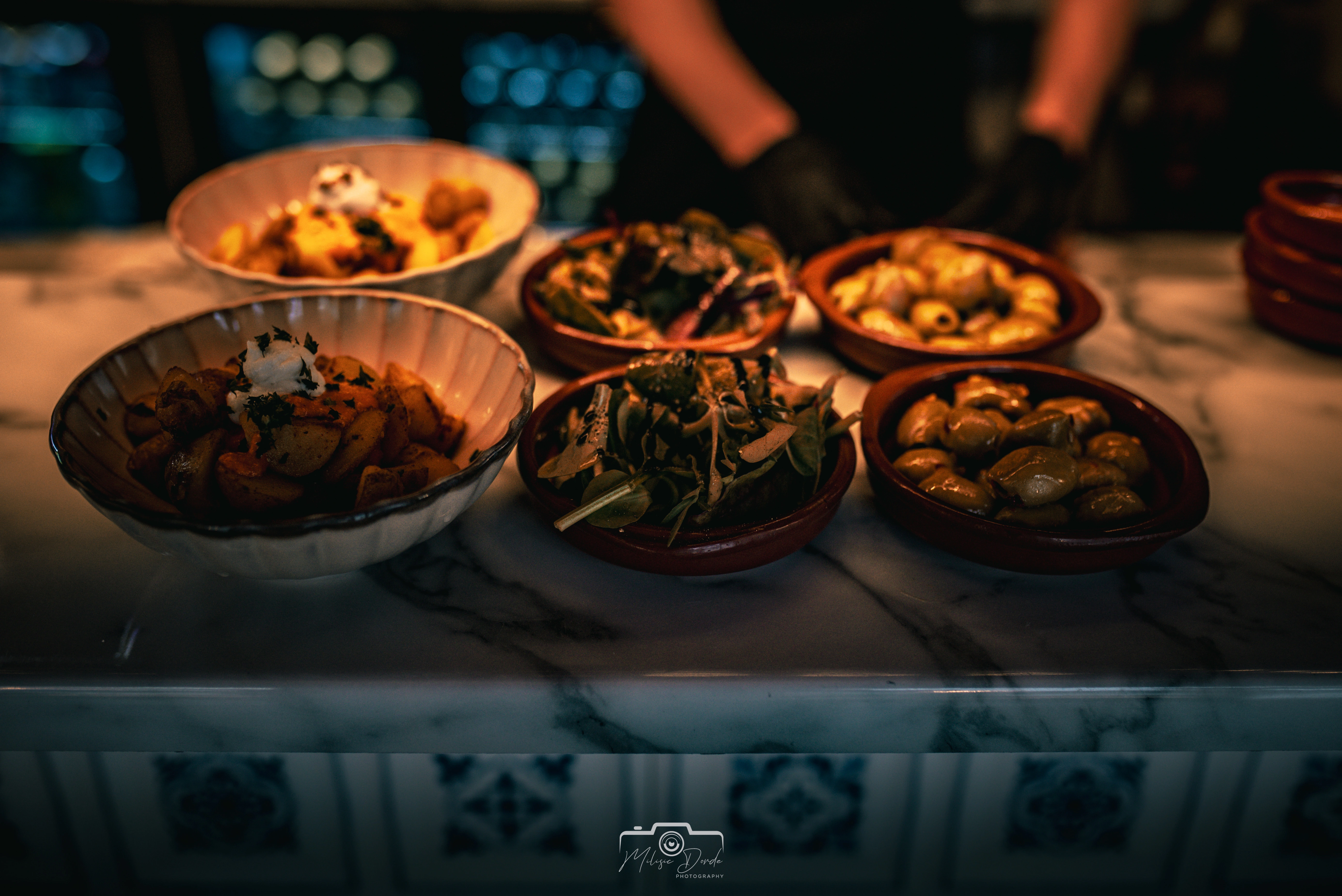Authentic flavors: A colorful spread of traditional Spanish tapas, made with premium imported ingredients. Image